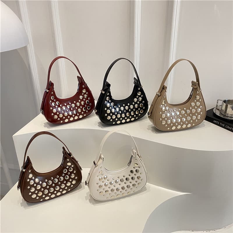 Wholesale Korean version of the light luxury hand new month package handbag summer new personality rivet shoulder bag commuter horror