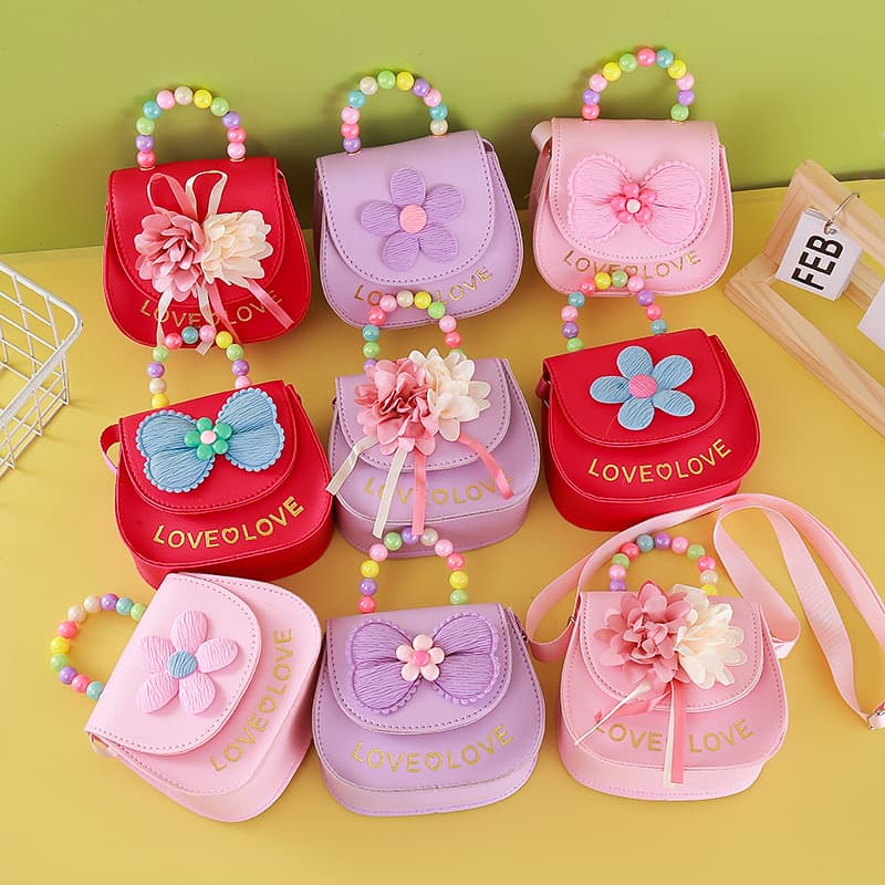 New children's coin purse cute small flower bow pearl handbag casual childlike diagonal shoulder bag wholesale