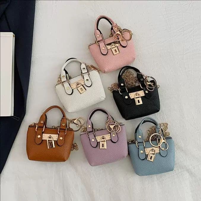 Korean version of girls Messenger handbags summer new personality classic children's hand shoulder diagonal bag